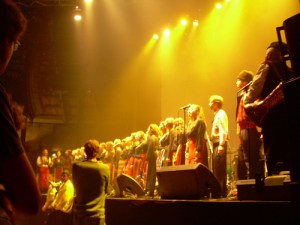 the London Bulgarian Choir onstage with British Sea Power at the Roundhouse